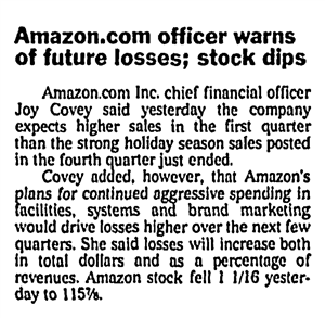 Newspaper clipping says amazon dot com officer warns of future losses. Stock dips. 
